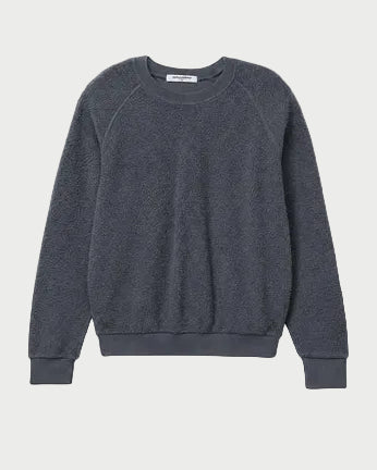 A dark gray crewneck sweatshirt with raglan sleeves, laid flat against a white background.