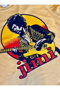 Up-close of Jimi Hendrix playing guitar on our band tee, available at west2westport.com