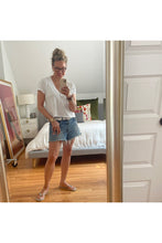 Load image into Gallery viewer, owner Kitt Shapiro wearing Moussy packard denim shorts and perfect white tee t-shirt at west2westport.com