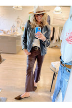 Load image into Gallery viewer, WEST owner Kitt Shapiro wearing leather crop flare pants and navy leather jacket at west2westport.com