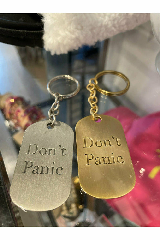 
            
                Load image into Gallery viewer, Don’t Panic key chain - WEST2WESTPORT.com
            
        